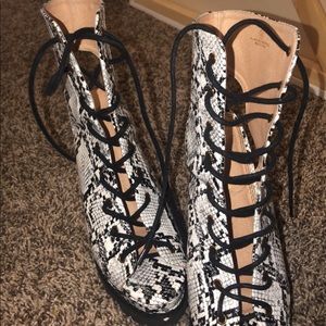 Snake skin lace up heel booties